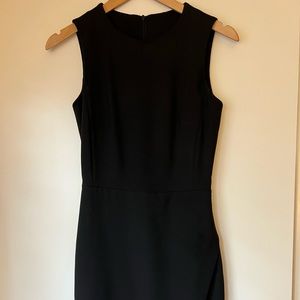 Fitted Black Dress with Tulip Opening